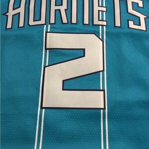 Jordan Teal and White Hornets Jersey